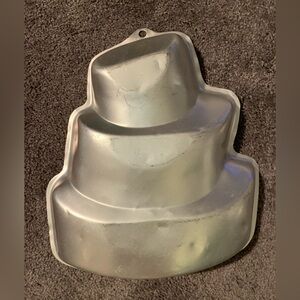 Vintage Wilton TOPSY TURVY 3-tier like Cake Pan.  Good used condition.
